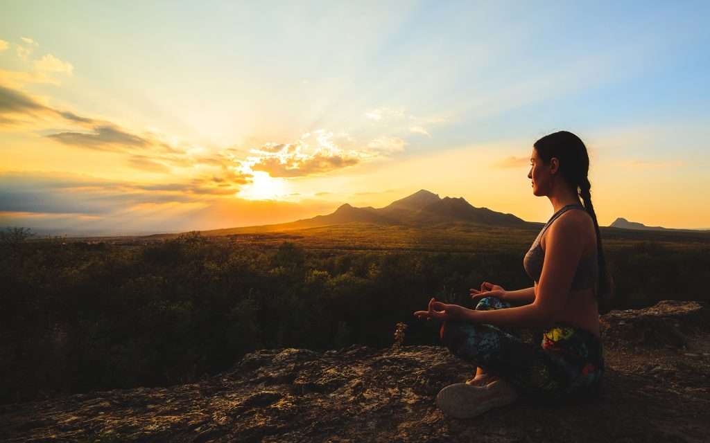 Shutterstock 1081636301 Woman meditating outside after using spravato to treat her depression